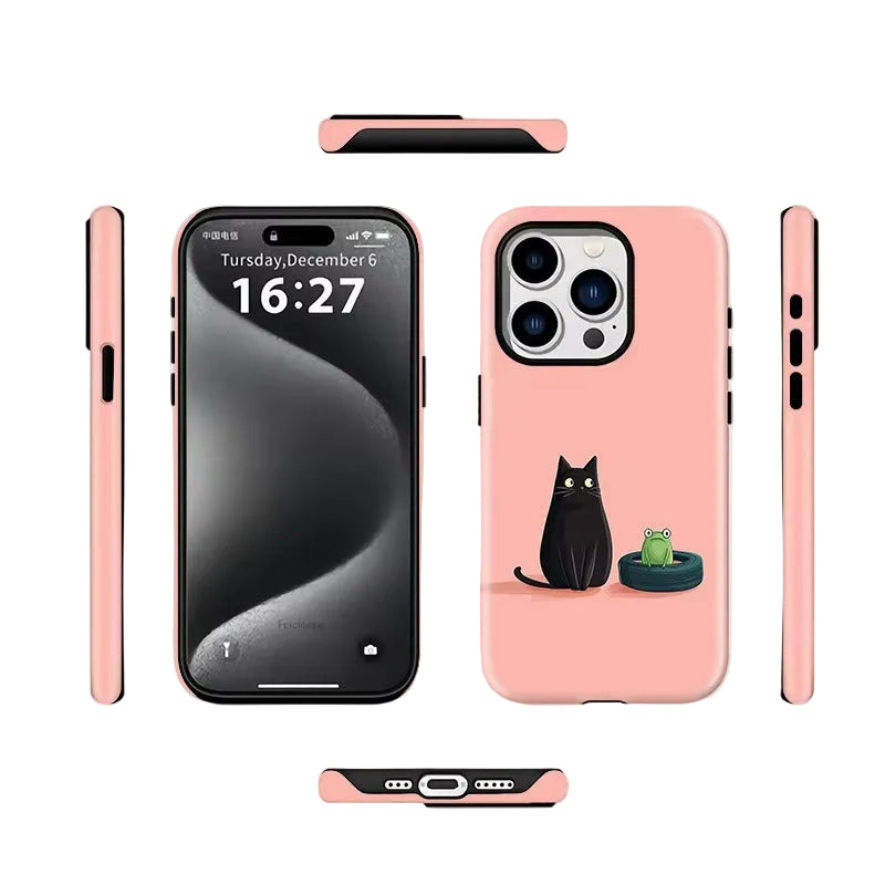 A pink phone case shown from multiple angles on a light gray background. The back of the case is pale pink with a printed illustration of a black cat sitting next to a small green frog in a bowl.