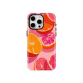 Phone case with fruit design on a light gray background